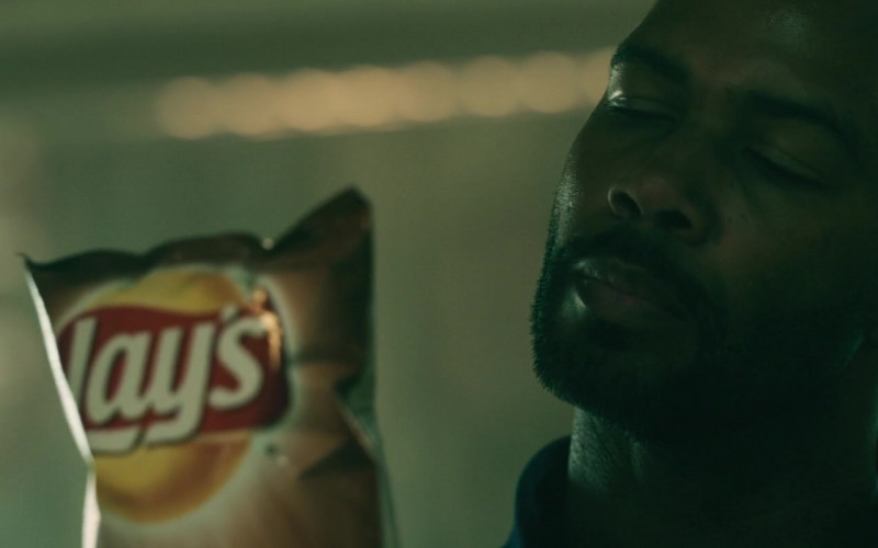 Lay's Chips Held by Omari Hardwick as Marquis T. Woods in Spell 2020 Movie (2)