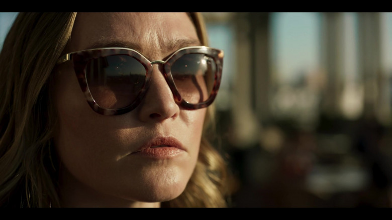 Prada 53SS Brown Sunglasses of Julia Stiles as Georgina Marjorie Clios in Riviera S03E08 TV Show (1)