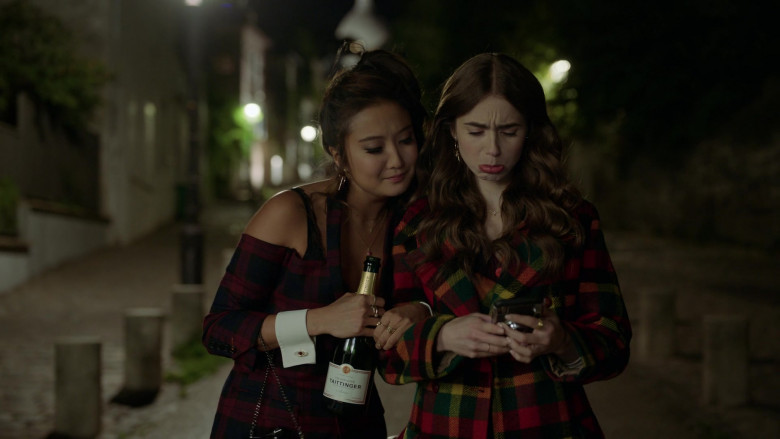 Taittinger Champagne Bottle Held by Ashley Park as Mindy Chen in Emily in Paris S01E05 (1)