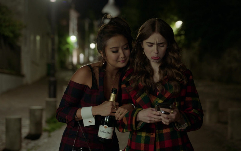 Taittinger Champagne Bottle Held by Ashley Park as Mindy Chen in Emily in Paris S01E05 (1)