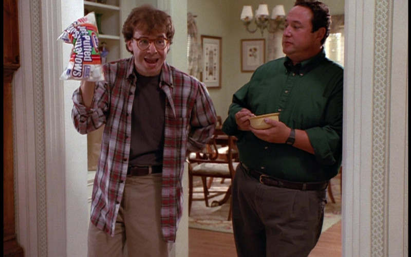 Kraft Jet-Puffed Marshmallows Held by Rick Moranis as Wayne Szalinski in Honey, We Shrunk Ourselves! (1997)