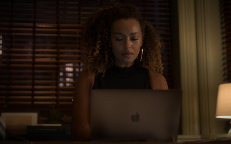 Apple MacBook Laptop of Melanie Liburd as Caridad ‘Carrie' Milgram in Power Book II Ghost S01E09