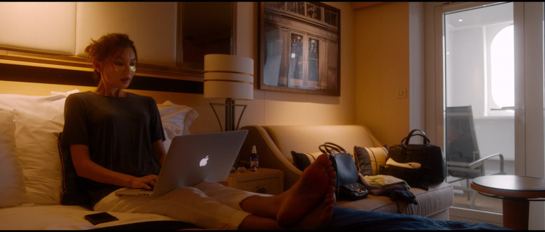Apple MacBook Pro Laptop of Gemma Chan as Karen in Let Them All Talk (2020)