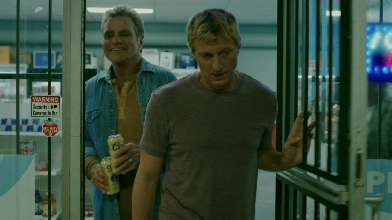 Coors Banquet Beer Cans Held by Martin Kove as John Kreese in Cobra Kai S02E02 Back in Black (1)
