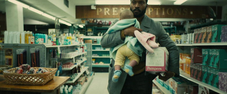 Pampers Diapers Box Held by Arinze Kene as Cal in I'm Your Woman (2020)