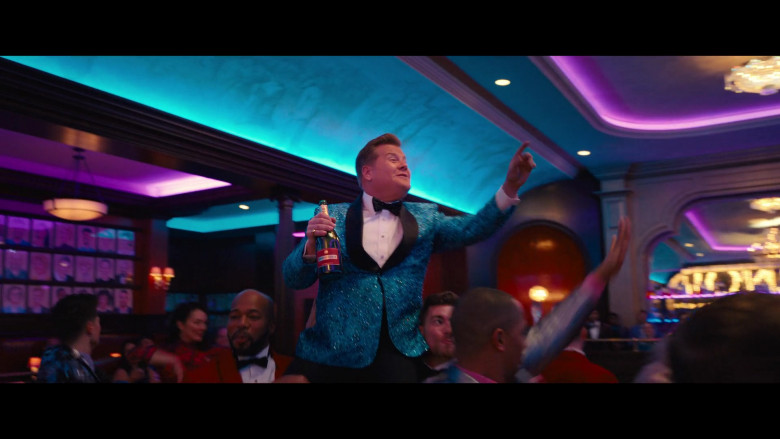 Piper Heidsieck Champagne Bottle Held by James Corden as Barry Glickman in The Prom (2)