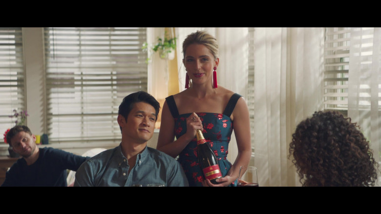 Piper-Heidsieck Champagne Bottle Held by Jessica Rothe as Jennifer Carter in All My Life