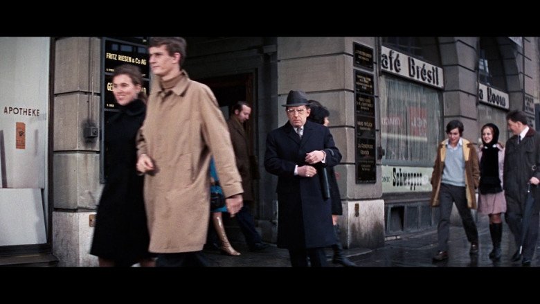 Schweppes sign in the window in On Her Majesty's Secret Service (1969)