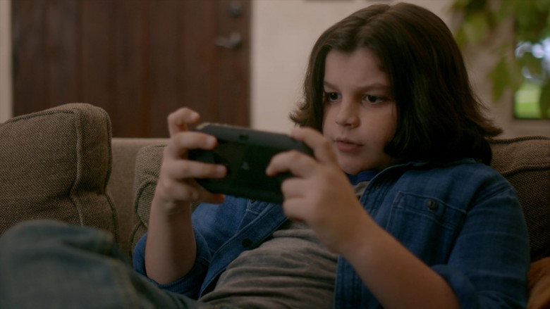 Sony PS Vita Handheld Video Game Console of Griffin Santopietro as Anthony in Cobra Kai S01E08 (1)