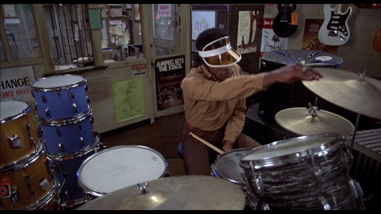 Ampeg Instrument company poster on the door at the bottom in The Blues Brothers (1980)