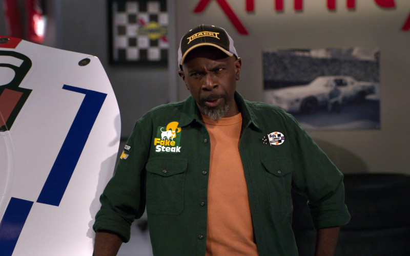 Mack Trucks Cap Worn by Actor Gary Anthony Williams as Chuck in The Crew S01E07 Ooof, Someone Throw A Robe On Grandma (2021)