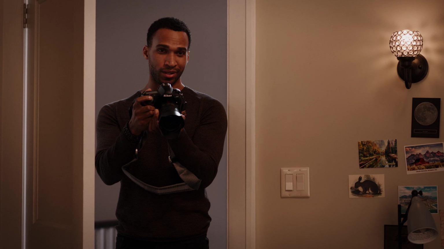 Nikon Camera Of Nathan Mitchell As Zion Miller In Ginny &