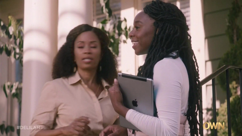 Apple iPad Tablet Held by Ozioma Akagha as Secretary Harper Omereoha in Delilah S01E01 Everything to Everybody (2021)