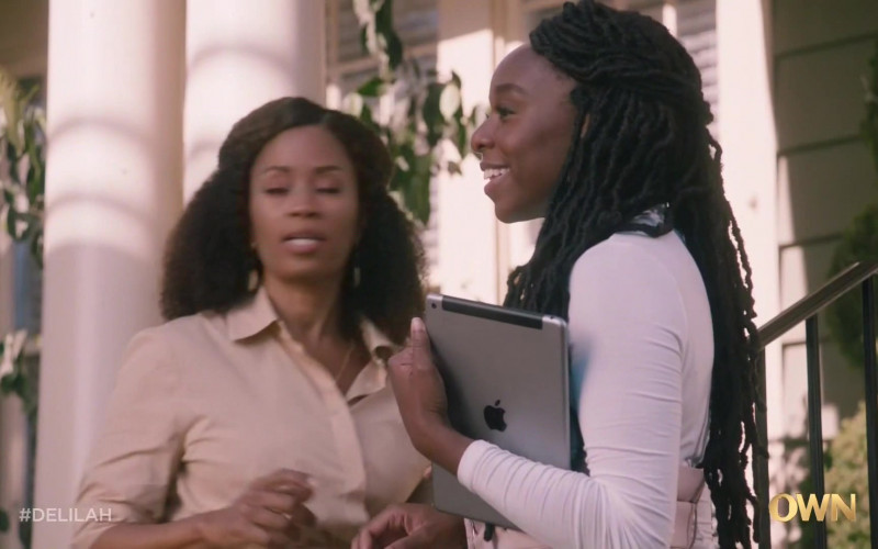 Apple iPad Tablet Held by Ozioma Akagha as Secretary Harper Omereoha in Delilah S01E01 Everything to Everybody (2021)