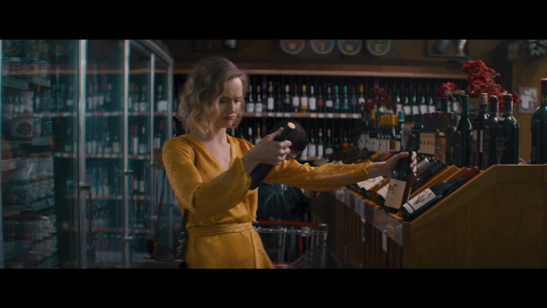 Decoy Wine Bottle Held by Kerry Bishé as Janet in Happily (2021)