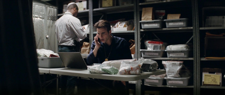 Dell Laptop of Nicholas Jarecki as Stanley Foster in Crisis (2021)