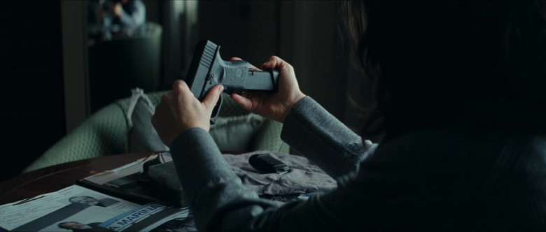 Glock Pistol of Evangeline Lilly as Claire Reimann in Crisis (2021)