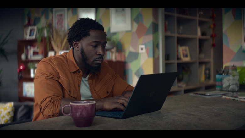 Microsoft Surface Laptop of Eric Kofi-Abrefa as Mark Bailey in The One S01E08 (2021)