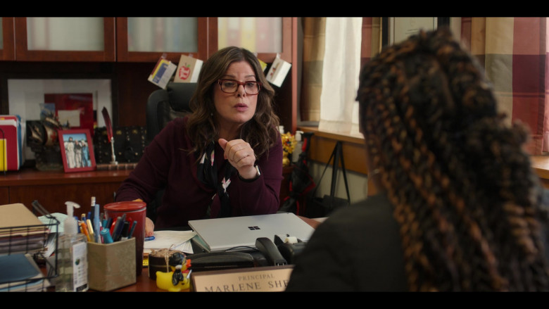 Microsoft Surface Laptop of Marcia Gay Harden as Principal Marlene Shelly in Moxie Movie by Netflix (1)