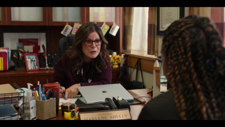 Microsoft Surface Laptop of Marcia Gay Harden as Principal Marlene Shelly in Moxie Movie by Netflix (2)