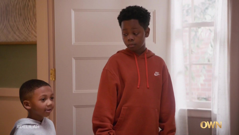 Nike Orange Hoodie of Braelyn Rankins as Marcus in Delilah S01E02 Toldja (2021)