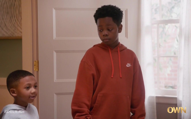 Nike Orange Hoodie of Braelyn Rankins as Marcus in Delilah S01E02 Toldja (2021)