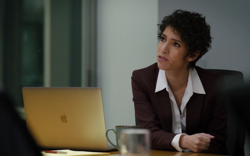 Apple MacBook Laptop of Diany Rodriguez as ADA Maria Delgado in Law & Order Organized Crime S01E01 TV Show