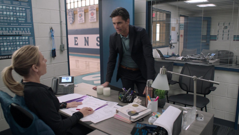 Cisco Phone of Jessalyn Gilsig as Holly Barrett in Big Shot S01E03 TCKS (2021)
