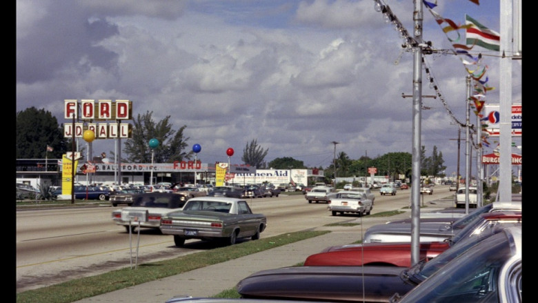 Ford dealership, Kitchenaid, Pepsi Billboard & Burger King in Goldfinger (1964)