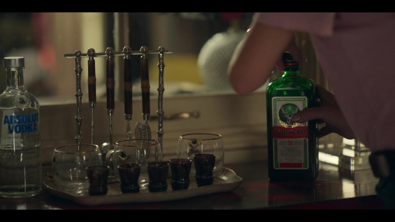 Absolut Vodka and Jägermeister Bottles in Sex Life S01E01 The Wives Are in Connecticut (2021)