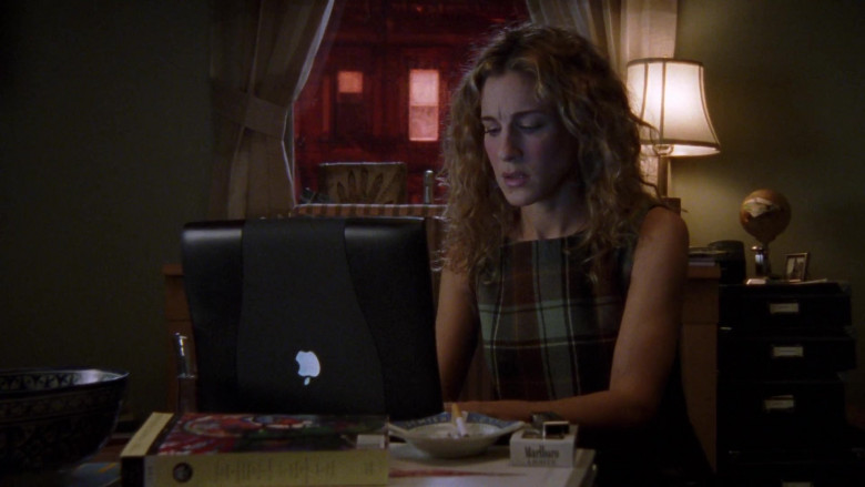 Apple PowerBook Laptop and Marlboro Light Cigarettes of Sarah Jessica Parker as Carrie Bradshaw in Sex and the City S04E02 The Real Me (2001)