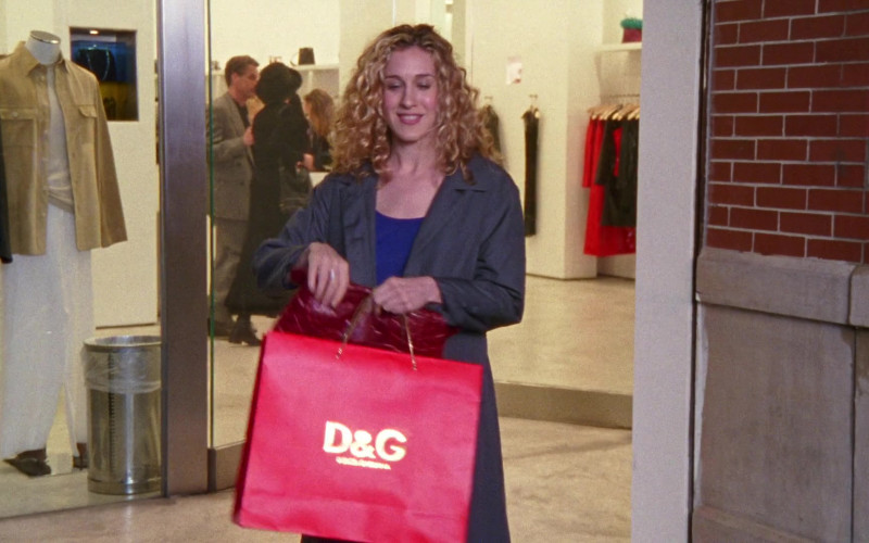 Dolce & Gabbana Paper Bag Held by Sarah Jessica Parker as Carrie Bradshaw in Sex and the City S01E05 The Power of Female Se