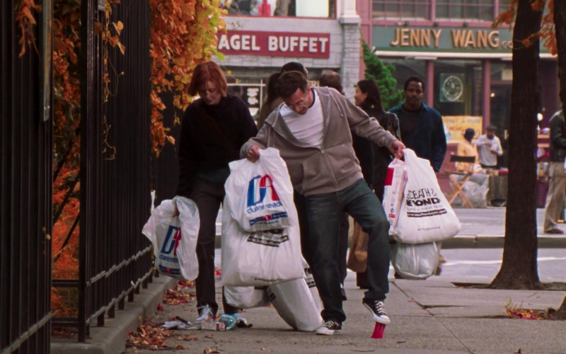 Duane Reade and Bed Bath & Beyond Store Plastic Bags Held by Cynthia Nixon as Miranda Hobbes and David Eigenberg as Steve Brady in Sex and the City S06E14 The Ick Factor (2004)