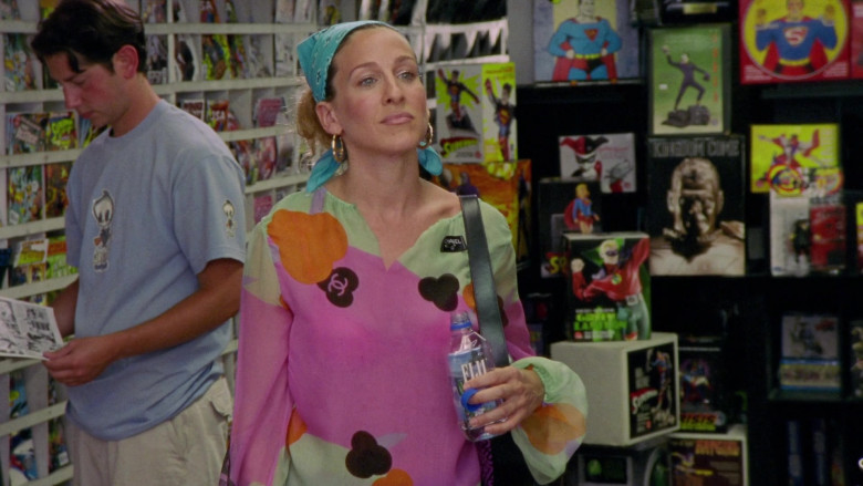 Fiji Water Bottle Held by Sarah Jessica Parker as Carrie Bradshaw in Sex and the City S03E15 Hot Child in the City (2000)