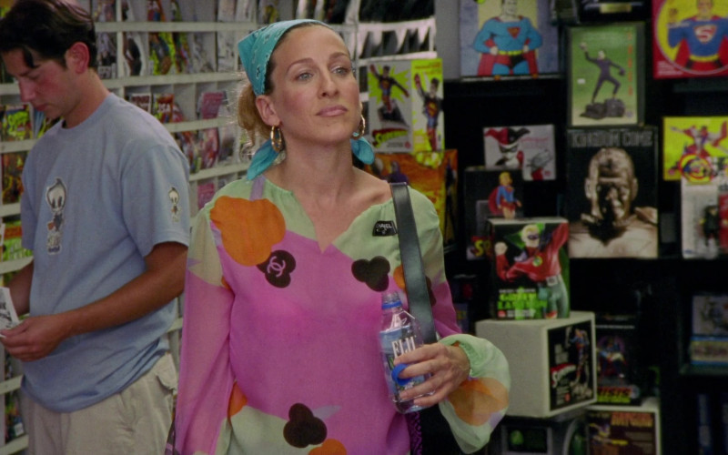 Fiji Water Bottle Held by Sarah Jessica Parker as Carrie Bradshaw in Sex and the City S03E15 Hot Child in the City (2000)