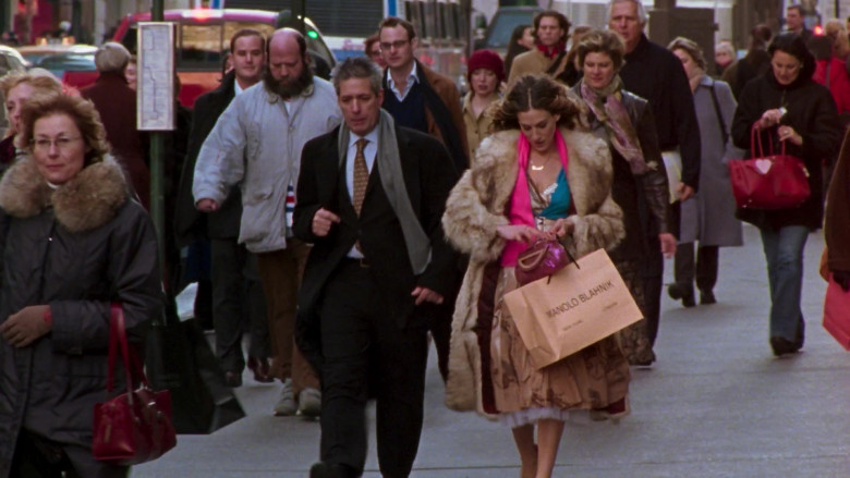 Manolo Blahnik Fashion Designer Shopping Bag Held by Sarah Jessica Parker as Carrie Bradshaw in Sex and the City S06E20 An American Girl In Paris (Part Deux) (2004)