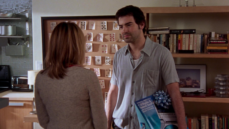 Sharper Image CD-Radio-Alarm Clock with Sound Soother Held by Ron Livingston as Jack Berger in Sex and the City S06E03 The Perfect Present (2003)