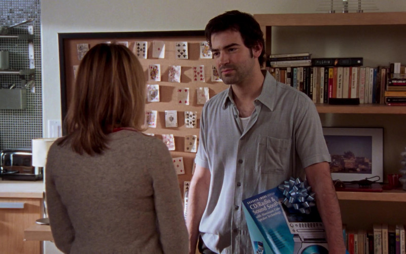 Sharper Image CD-Radio-Alarm Clock with Sound Soother Held by Ron Livingston as Jack Berger in Sex and the City S06E03 The Perfect Present (2003)