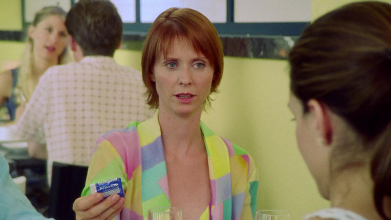 Trojan ENZ Lubricated Condom Held by Cynthia Nixon as Miranda Hobbes in Sex and the City S03E14 Sex and Another City (2000)