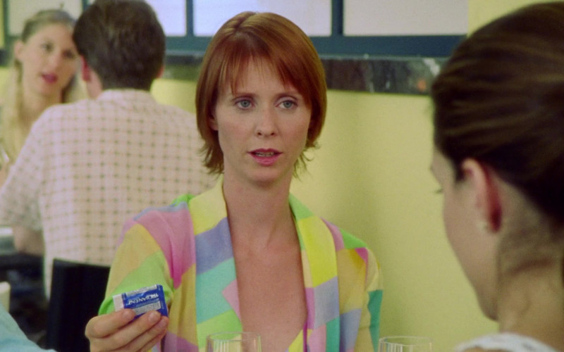 Trojan ENZ Lubricated Condom Held by Cynthia Nixon as Miranda Hobbes in Sex and the City S03E14 Sex and Another City (2000)