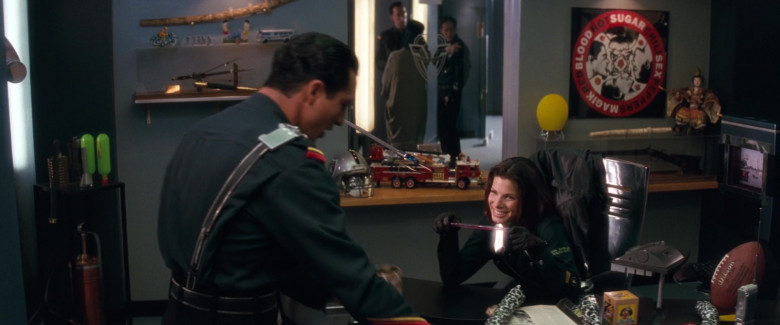 Wilson Football of Sandra Bullock as Lieutenant Lenina Huxley in Demolition Man (1993)