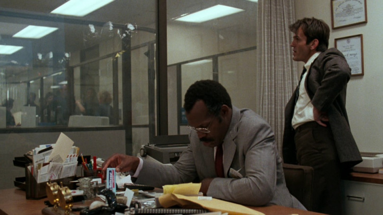 Alka-Seltzer Medication Held by Danny Glover as Sergeant Roger Murtaugh in Lethal Weapon (1987)