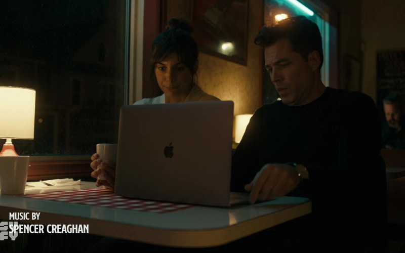 Apple MacBook Pro Laptop of Tim Rozon as Luke Roman in SurrealEstate S01E01 Pilot (2021)