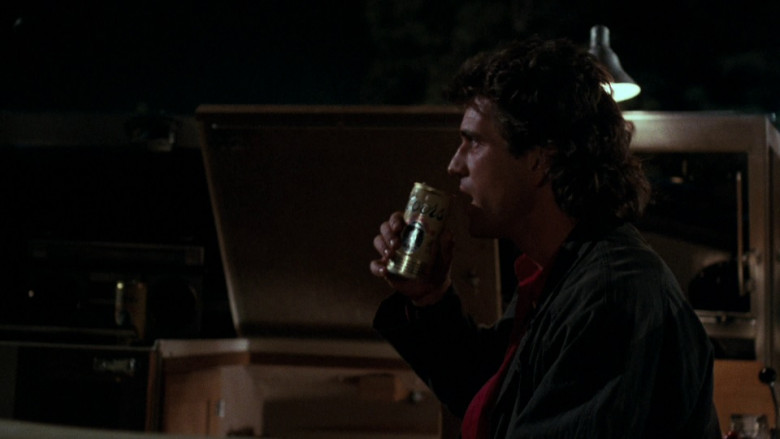 Coors Beer Enjoyed by Mel Gibson as Sergeant Martin Riggs in Lethal Weapon (1987)