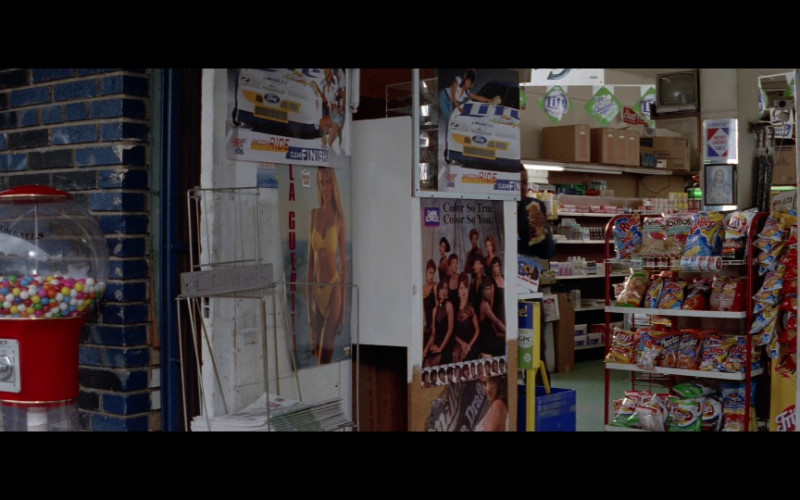 Ford posters, Ruffles, Tostitos, Lays, Cheetos in Rush Hour (1998)