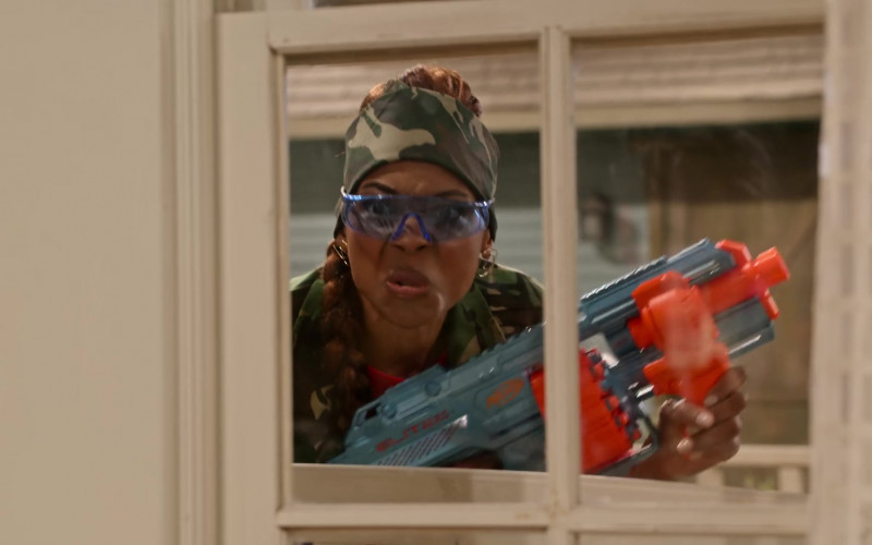 Nerf Blaster Toy Gun of Tia Mowry as Cocoa McKellan in Family Reunion S04E07 Remember M’Dear’s Roast (2021)