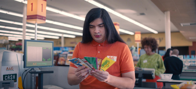 Funyuns Corn Snack Coupon Held by Eduardo Franco as Greg in Queenpins (2021)