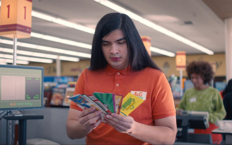 Funyuns Corn Snack Coupon Held by Eduardo Franco as Greg in Queenpins (2021)