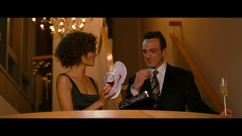 Nike Sneakers Held by Thandiwe Newton as Libby Odell (credited as Thandie Newton) in Run Fatboy Run (2007)