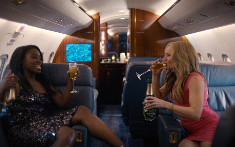 Perrier-Jouët Champagne Enjoyed by Kirby Howell-Baptiste as JoJo Johnson and Kristen Bell as Connie Kaminski in Queenpins (2021)